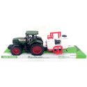 TRAKTOR Z MASZYNĄ POD KLOSZEM